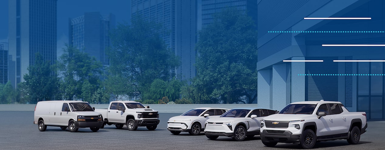 Lineup of multiple GM Vehicles parked side by side.