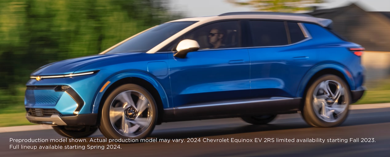 The New 2024 Chevrolet Equinox EV speeding down a highway.