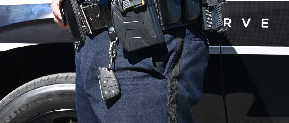 GM car key on police's duty belt.