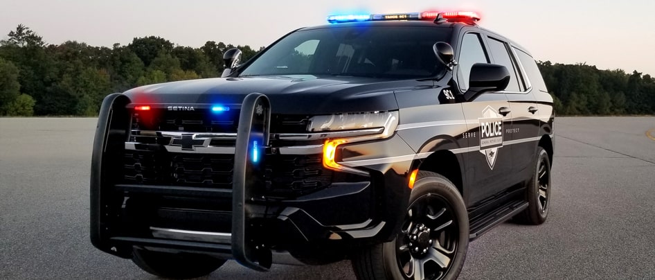 Front-side view of Chevrolet Tahoe PPV police vehicle in a parking lot.