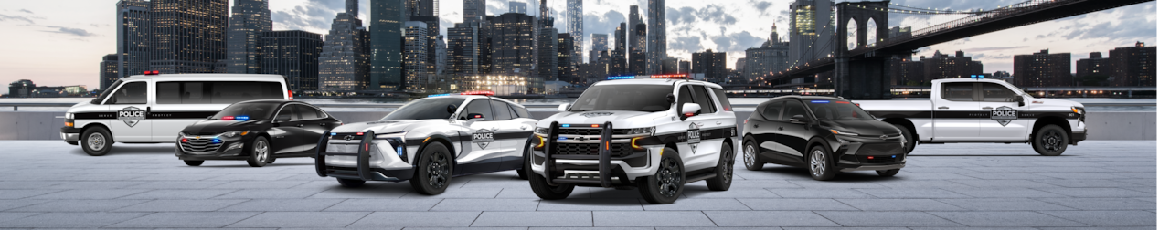 GM Envolve police fleet truck and SUV parked side by side.