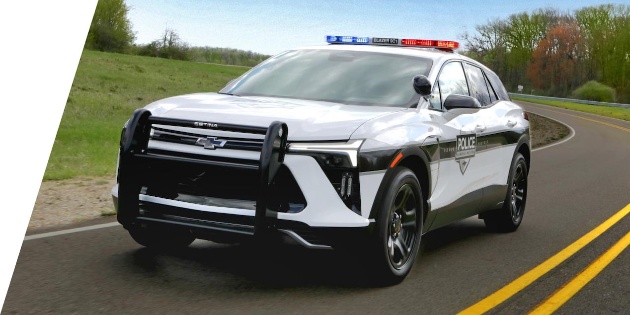 A GM Fleet Police vehicle driving alone on the road.