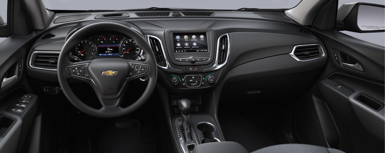 Driver's perspective of the leathery interiors of the 2024 Chevrolet Equinox.