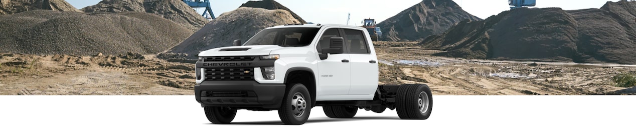 2024 Chevrolet Silverado 3500 HD Chassis Cab Truck on a construction area background.