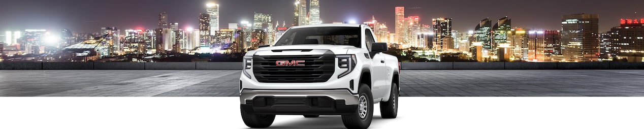 GM Fleet 2024 GMC Sierra 1500 on a lit-up city background.