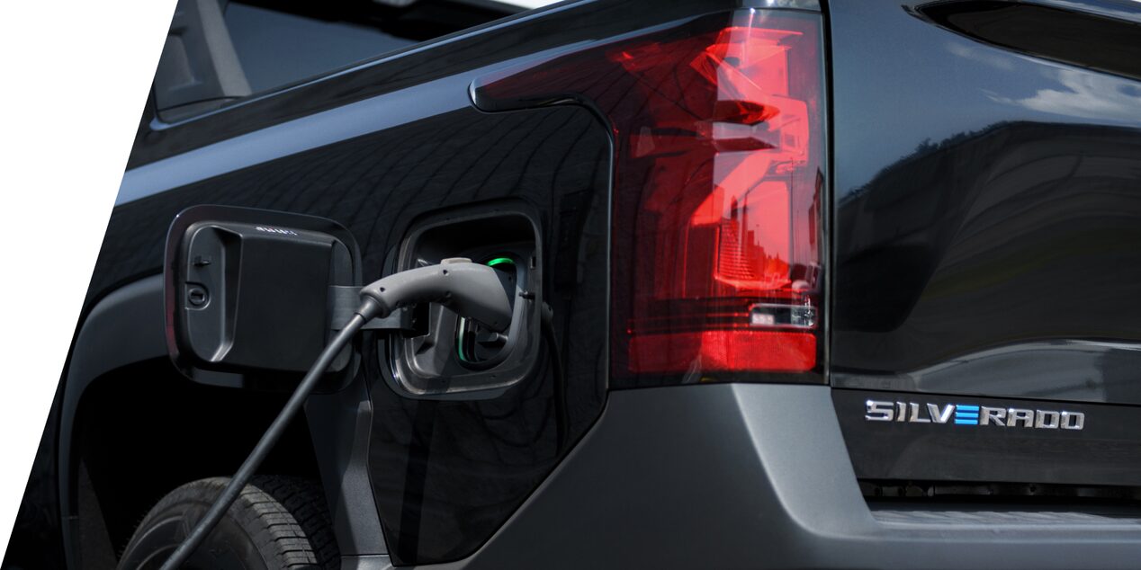 An exterior closeup shot of the charging port for the 2024 Silverado EV.