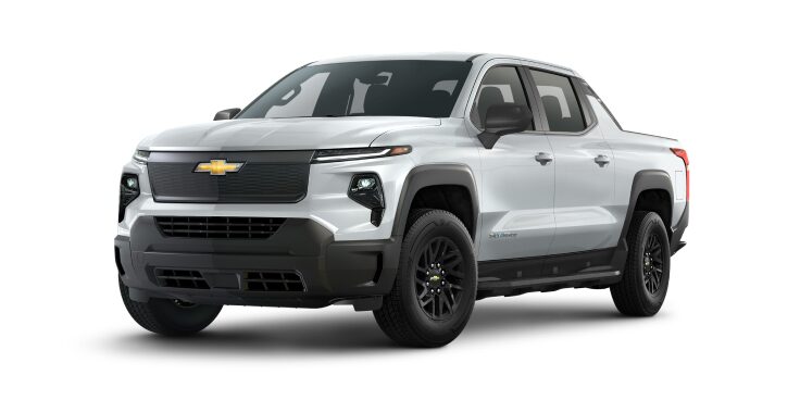 An exterior left facing jellybean shot of the Summit White 2024  Silverado EV with 8 WT.