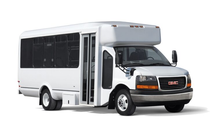 Front Three-Quarters View of the 2023 GMC Savana Van with Shuttle Bus Upfit Application