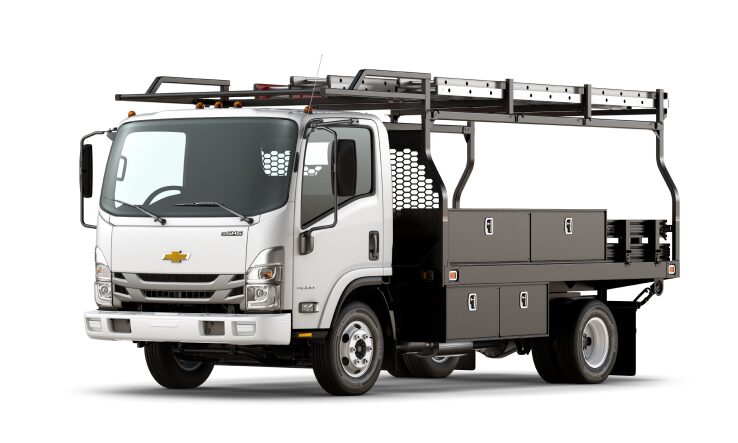 Three-Quarters Front View of the 2023 Chevrolet Low Cab Forward 6500 XD/7500 XD Truck With Utility Upfit Application