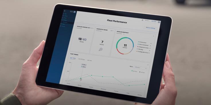 a tablet showing a fleet vehicle insights plan