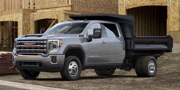 A GMC truck parked on a job site