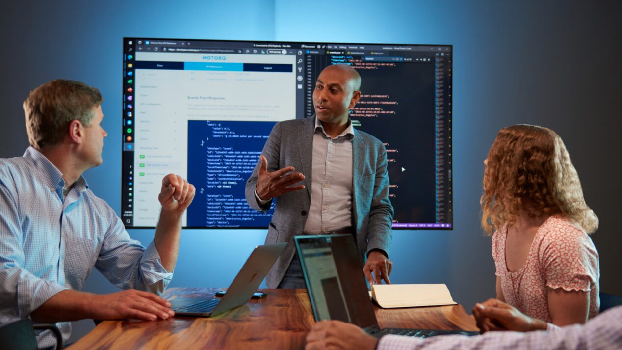 Team of office workers having a conversation