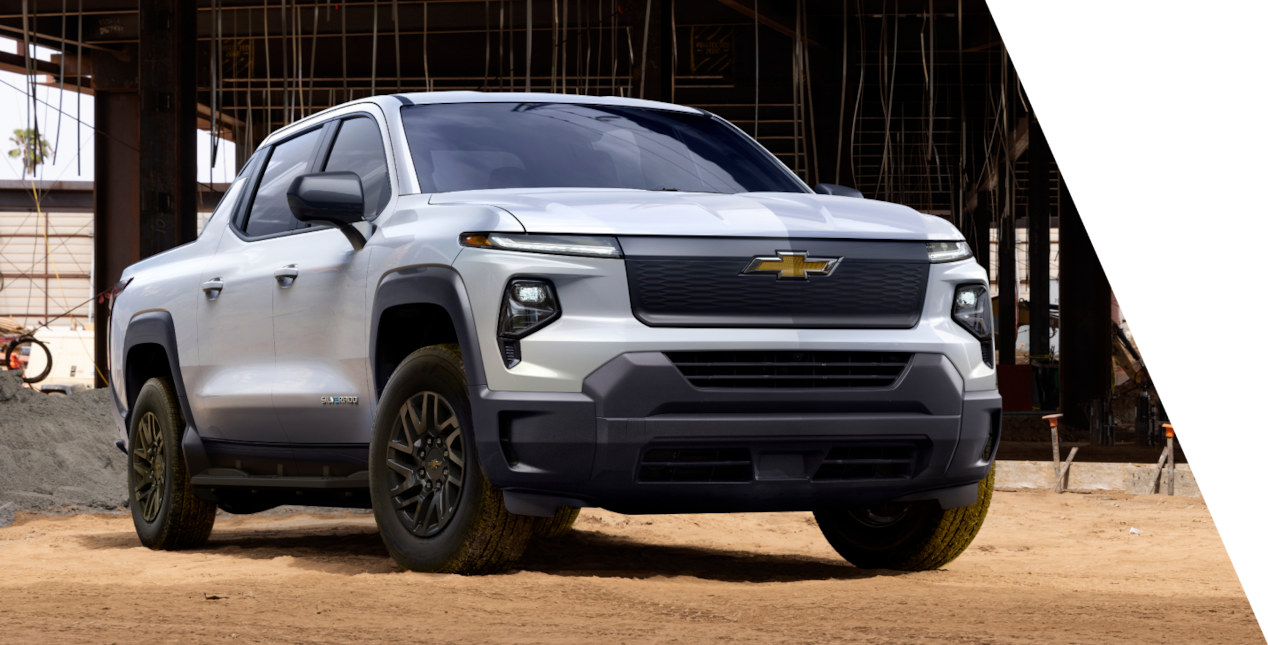 Front Side View of a Chevrolet Silverado Electric Truck at a Job Site