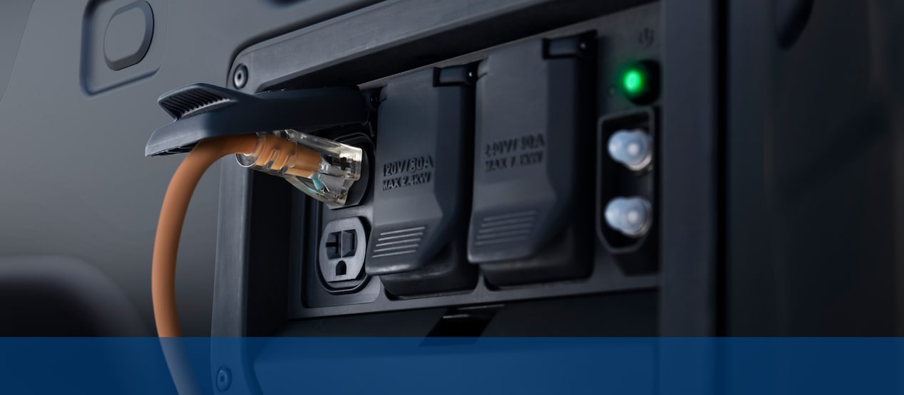 View of the outlets available in the lockable and weatherproof eTrunk compartment in the Electric Chevrolet Silverado