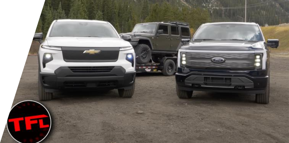 A Chevrolet Truck and a Ford Truck Parked Side by Side