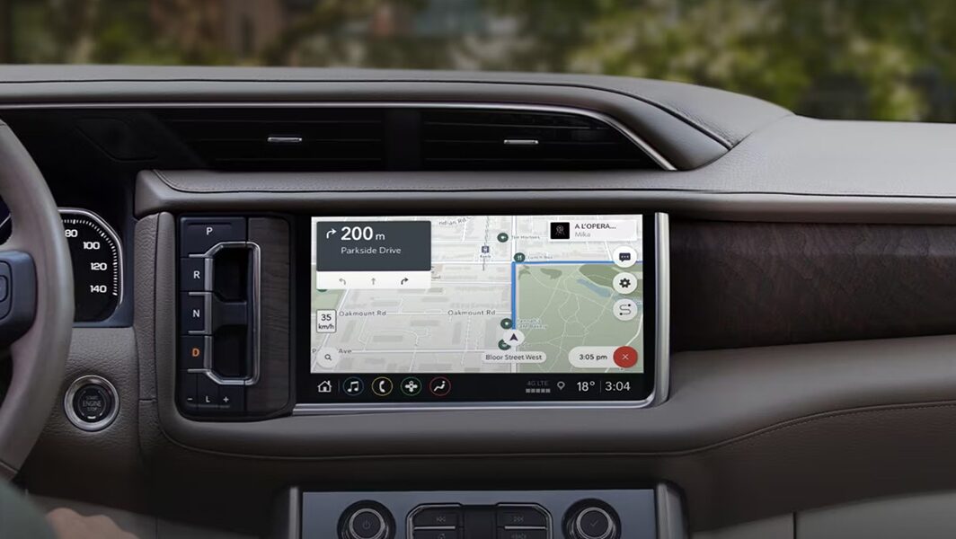 OnStar Navigation GPS inside car on dashboard.