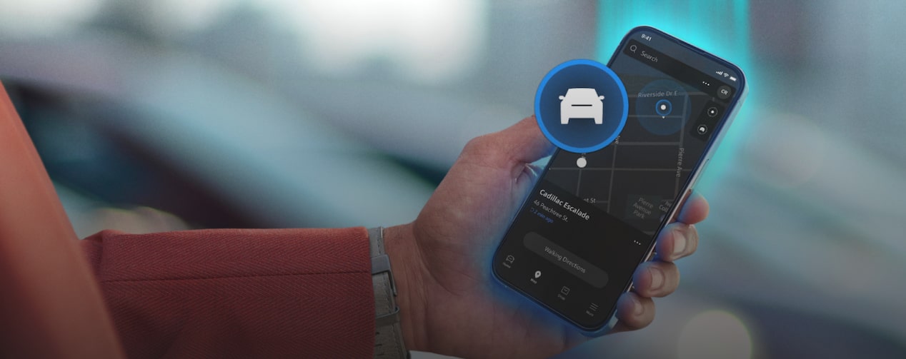 A person accessing OnStar's vehicle mobile app through a smartphone.