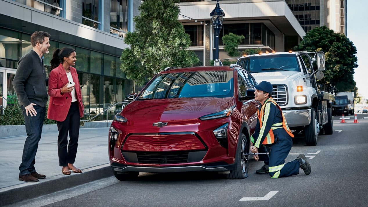 Chevrolet vehicle tire being fixed by OnStar.