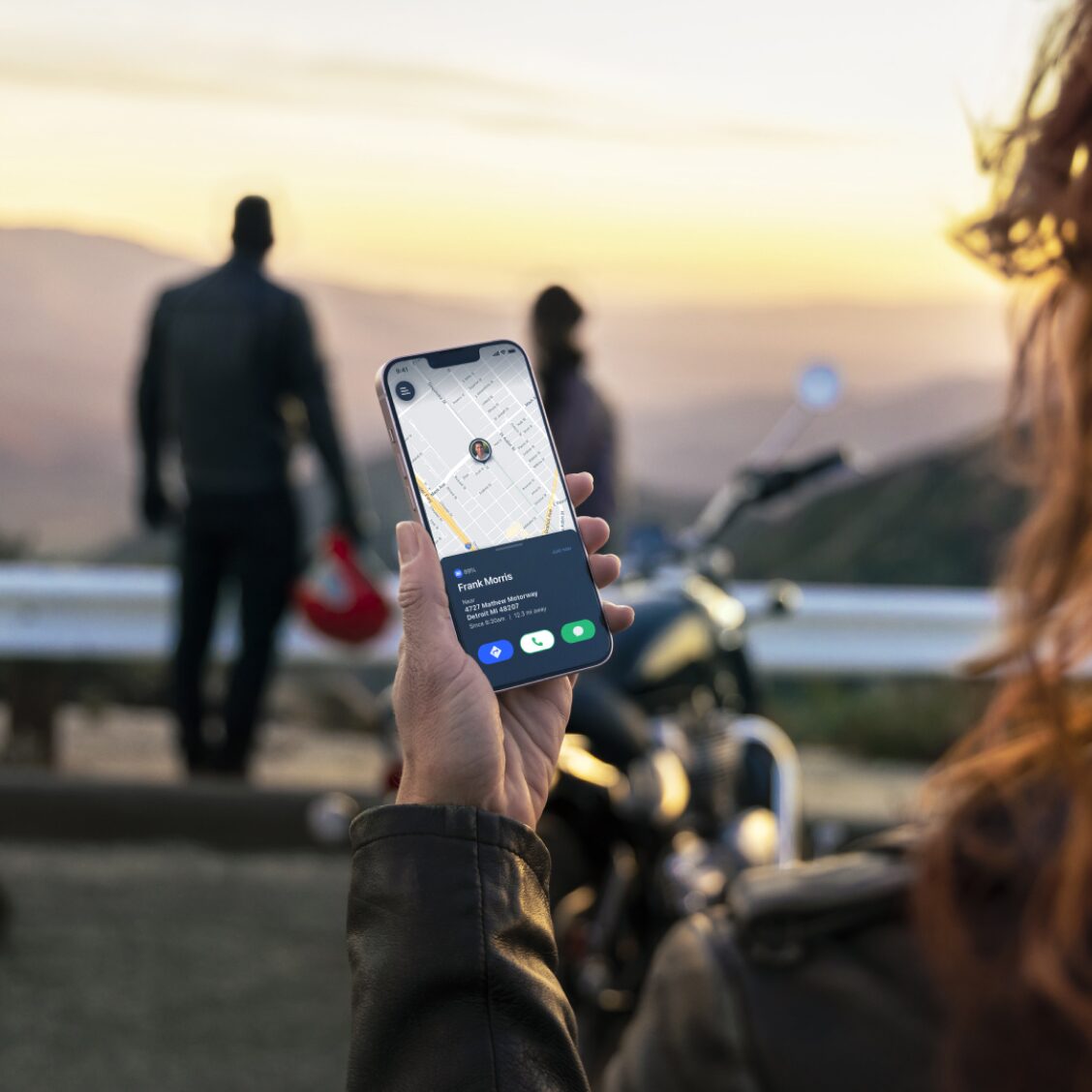 A person using her phone to access OnStar's traffic update feature.